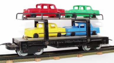 schwarzer Autotransporter mit Opel Kapitn